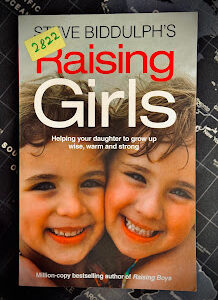 Cover image of the book "Raising Girls," featuring a vibrant and insightful guide to understanding the emotional, social, and intellectual needs of girls as they grow.